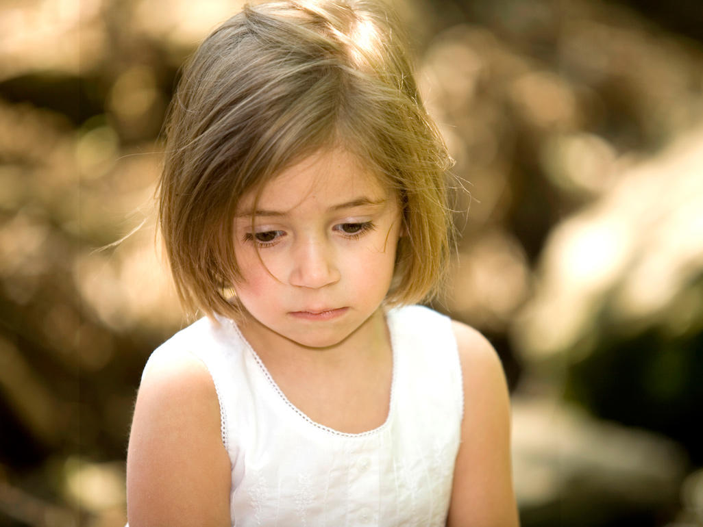 Kind looking. Girl looking down. Cute girl looking down. Sad girl looking down. Girls looking down at you.